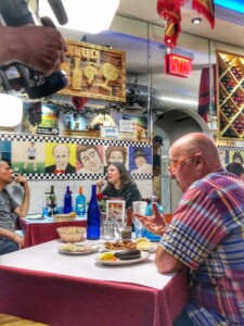 Andrew Zimmern enjoying typical food from Argentina